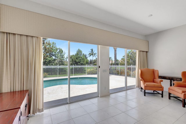 living area with light tile patterned floors