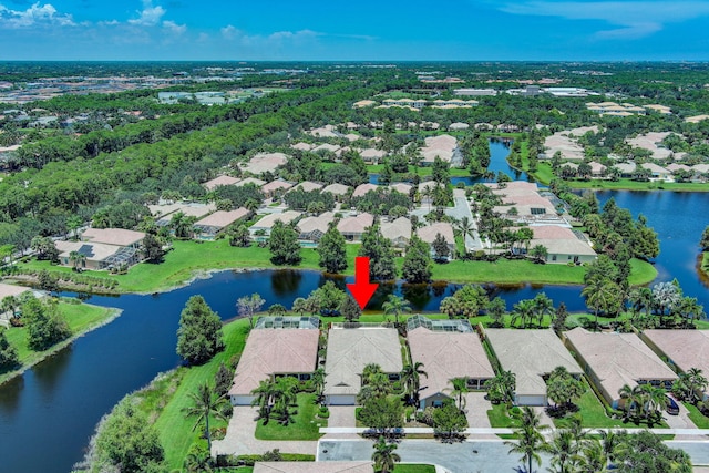 aerial view with a water view and a residential view