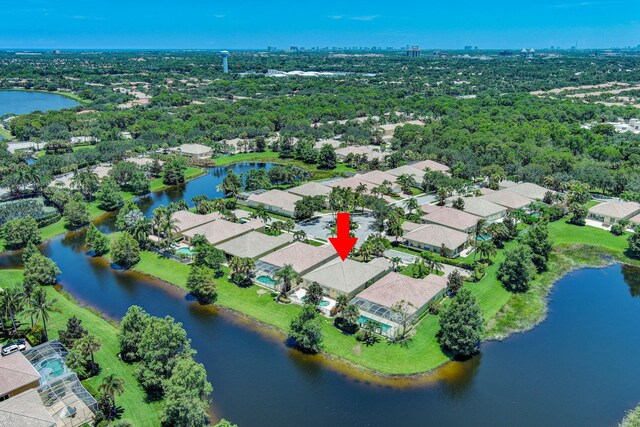 bird's eye view with a residential view and a water view
