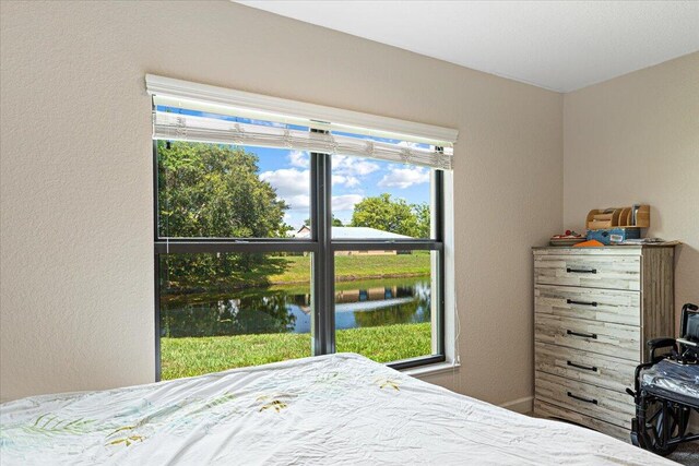 bedroom with a water view