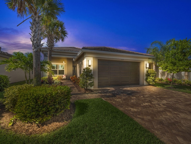 view of front of property with a garage