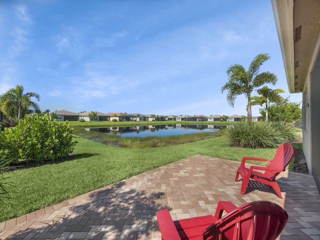 view of patio / terrace with a water view