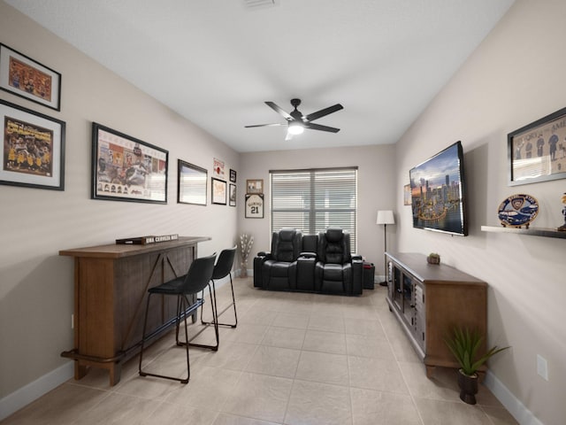 tiled office space featuring ceiling fan