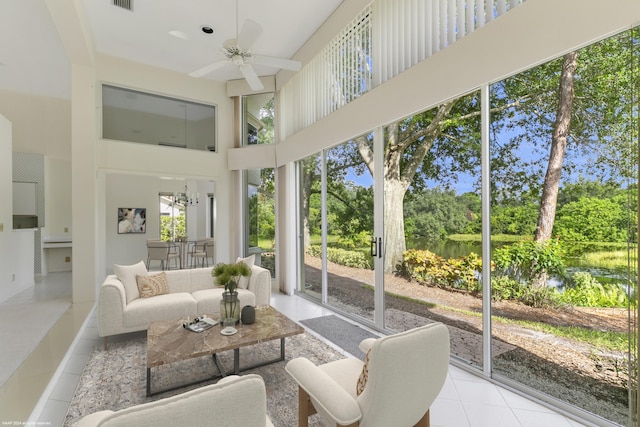 sunroom with ceiling fan