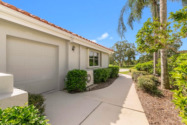 exterior space with a garage