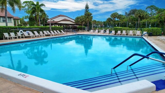 view of swimming pool with a gazebo