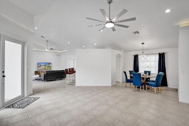 dining space with high vaulted ceiling, light tile patterned floors, and ceiling fan