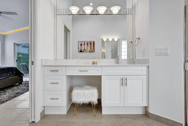 bathroom featuring vanity, tile patterned flooring, and ceiling fan