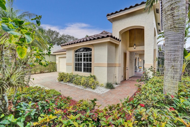 entrance to property featuring a garage