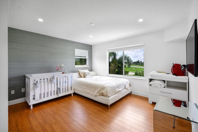 bedroom featuring hardwood / wood-style floors