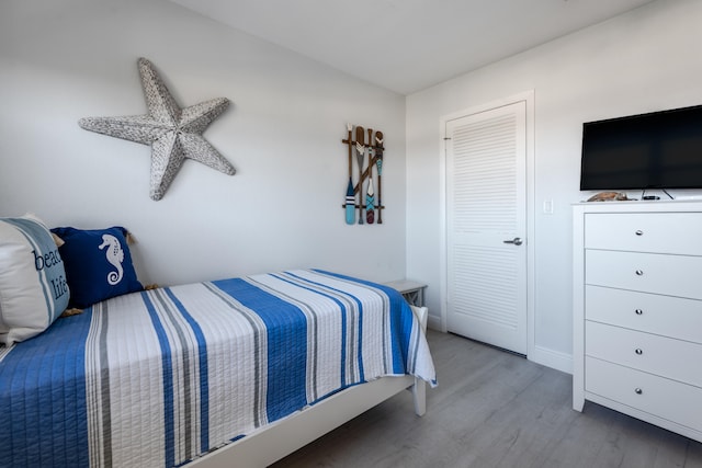 bedroom with light hardwood / wood-style flooring