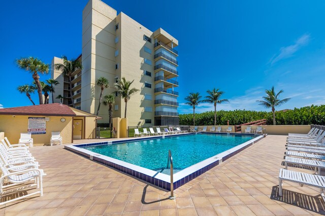 view of swimming pool featuring a patio