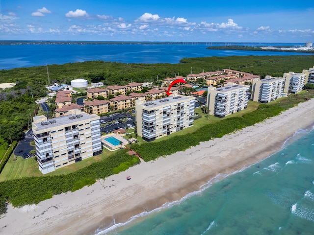 aerial view featuring a water view and a view of the beach