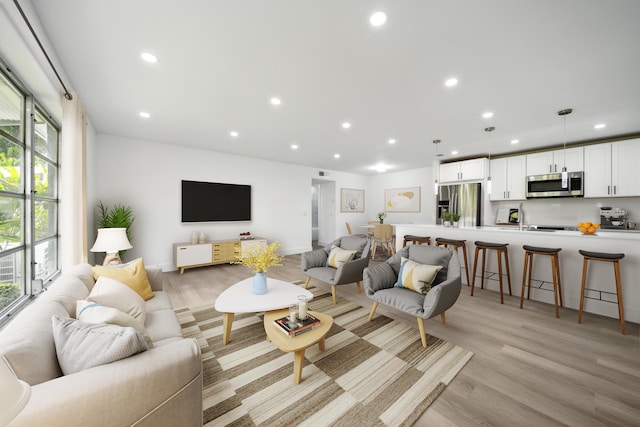 living room featuring light hardwood / wood-style flooring