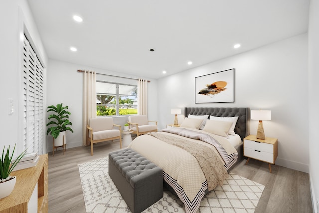 bedroom with light hardwood / wood-style flooring