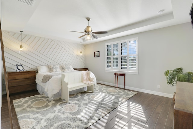 bedroom with dark wood-type flooring and ceiling fan