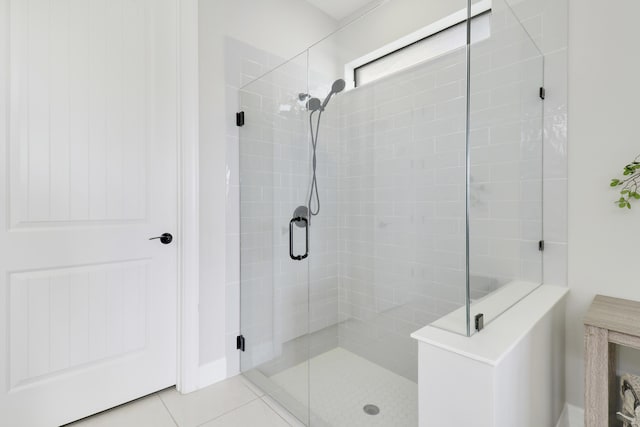 bathroom featuring tile patterned floors and walk in shower