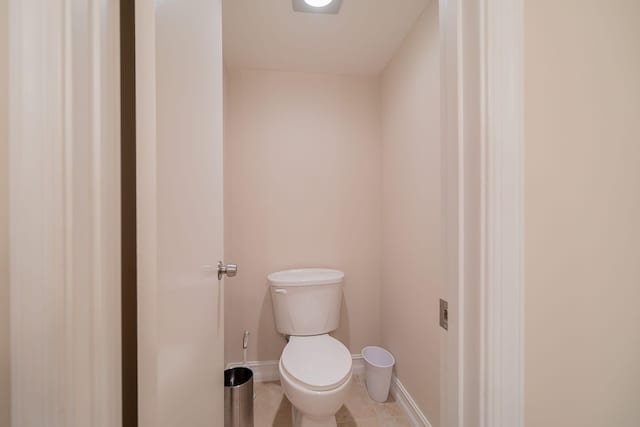 bathroom featuring tile patterned floors and toilet