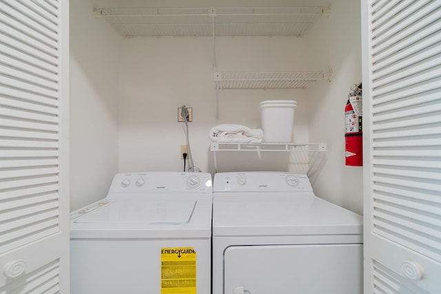 laundry area featuring washing machine and dryer