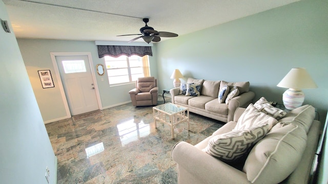 living room with ceiling fan