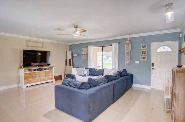 living room featuring tile patterned floors, ceiling fan, and crown molding