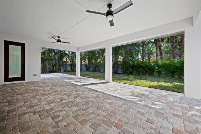 view of patio featuring ceiling fan