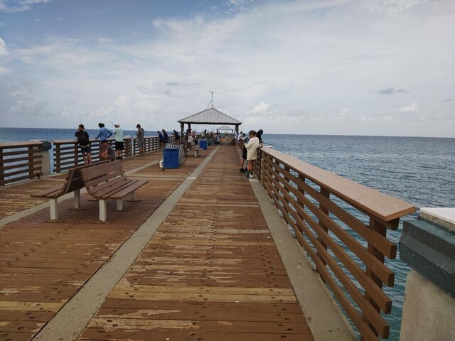 exterior space featuring a gazebo and a water view