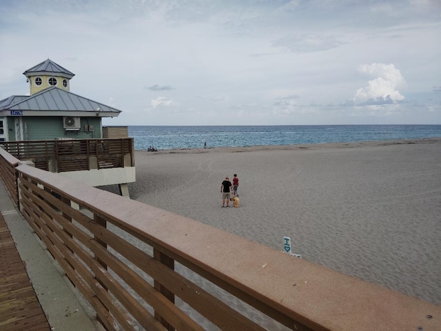 property view of water featuring a view of the beach