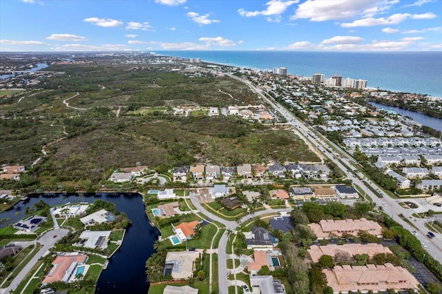 birds eye view of property featuring a water view