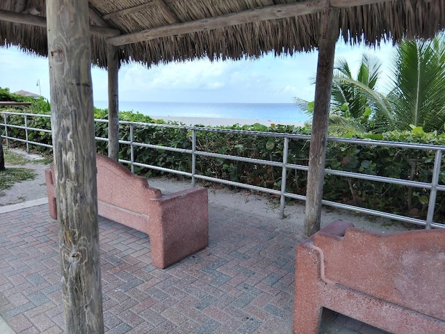 view of patio featuring a water view