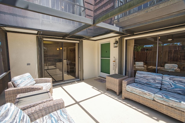 view of patio / terrace with a balcony