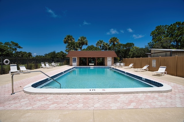 view of pool with a patio area