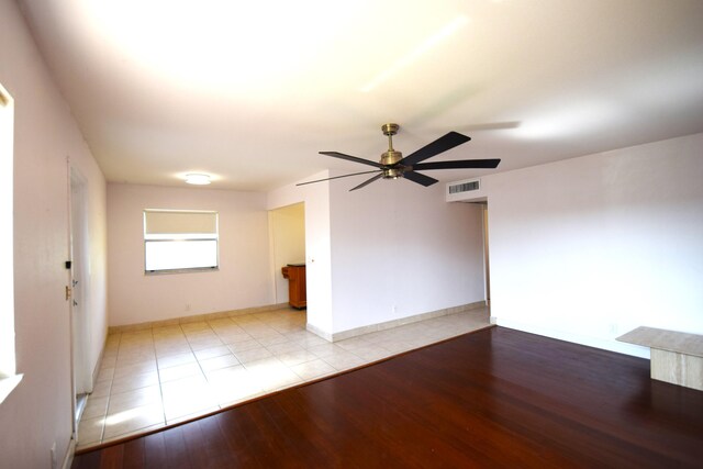 interior space with ceiling fan and light wood-type flooring