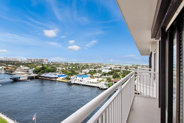 balcony featuring a water view