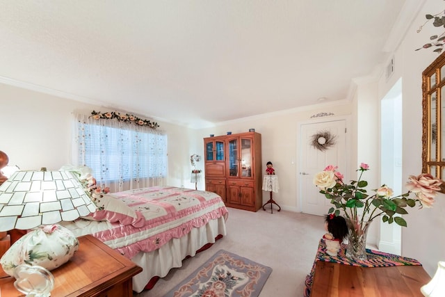 carpeted bedroom featuring ornamental molding