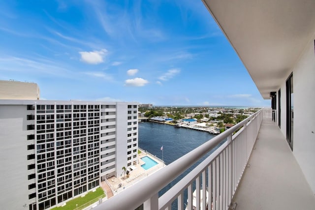 balcony featuring a water view