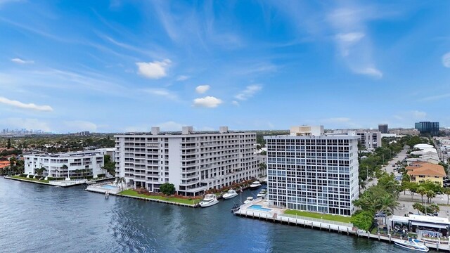 drone / aerial view featuring a water view