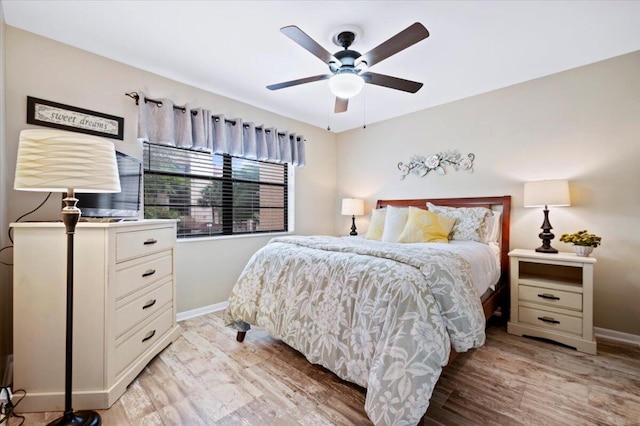 bedroom featuring ceiling fan and light wood-type flooring