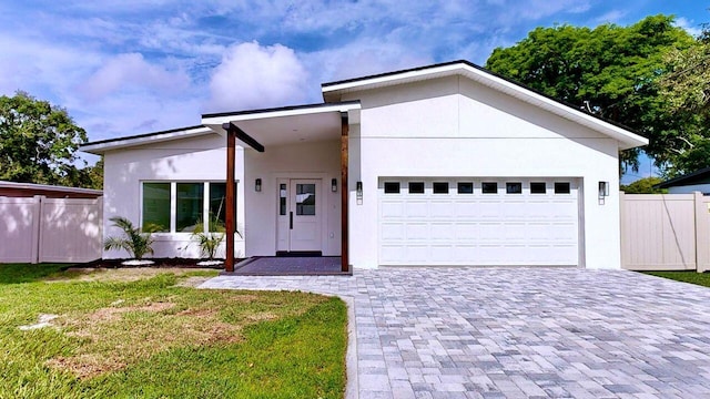 view of front of home with a front lawn