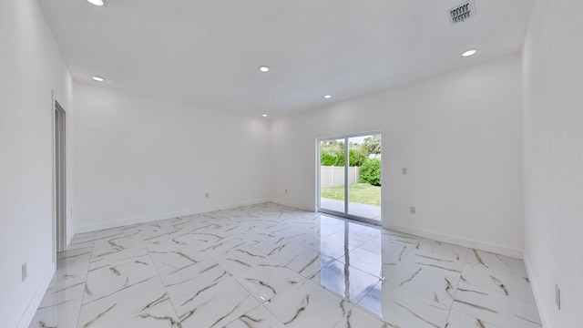 view of tiled spare room