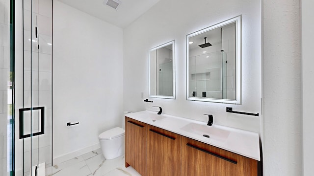 bathroom featuring vanity, toilet, and tile patterned floors