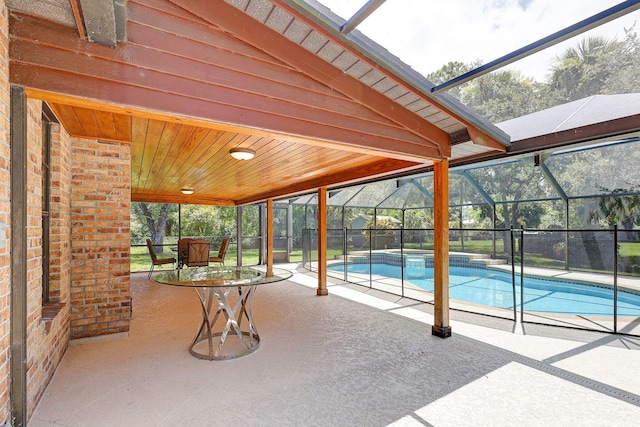 view of patio with a lanai