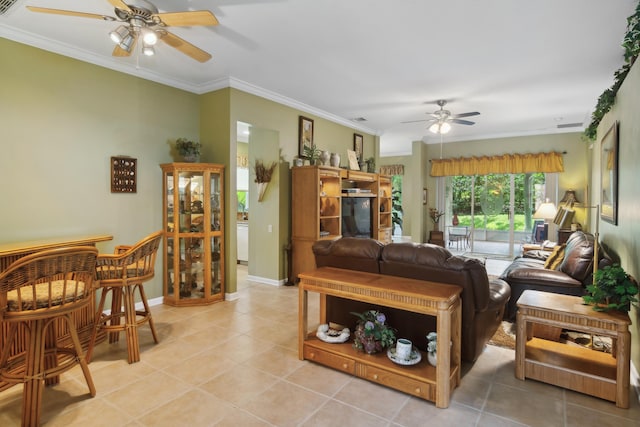 tiled living room featuring ornamental molding and ceiling fan