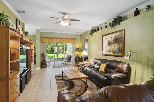 tiled living room featuring ornamental molding and ceiling fan