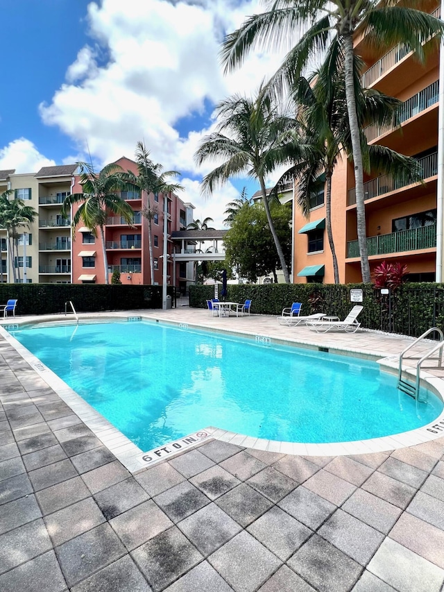 pool featuring a patio