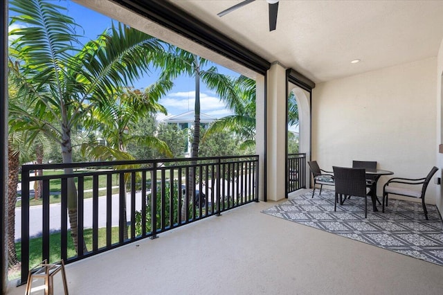 balcony featuring ceiling fan