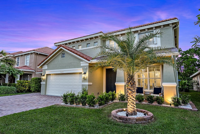 view of front of home with a yard