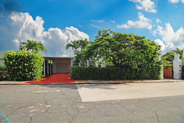 view of front of house featuring a carport