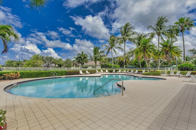 view of swimming pool with a patio area