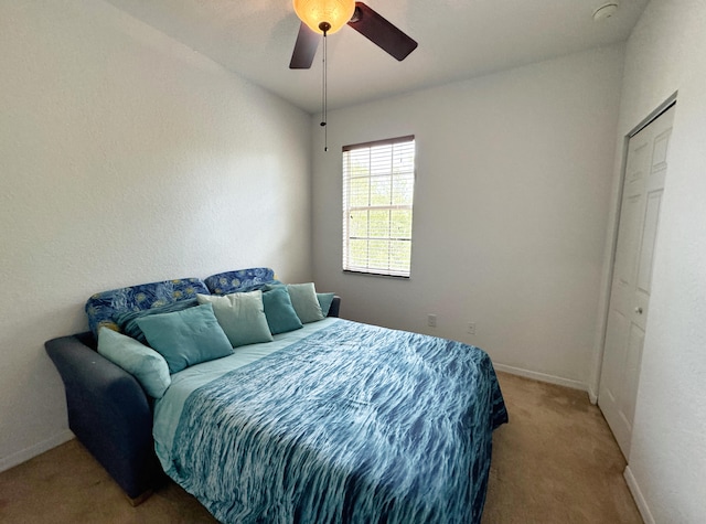 bedroom featuring carpet and ceiling fan